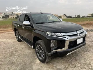  7 بك اب ميتسوبيشي 2022 بحال الوكاله مستخم اول كرت ابيض اربعه جيد لون اسود استخدام بسيط جدا