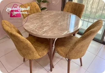  3 دللي منزلك بطاولة سفرة دائرية أنيقة   مثالية للمساحات مع 4 كراسي  بتصميمها التركي الأصيل