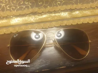  1 نضارت Ray-Ban الغنيه عن التعريف رجاليه بلون مميز غير مشخوطه ولا مشعوره النظاره حالت الجديده بسعر نار
