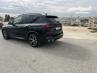  4 بي ام دبليو X5 لون اسود موديل 2022 Mكيت فل كامل فحص كامل وارد وكاله عمان