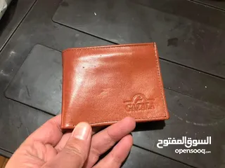  4 محافظ جلد رجالي