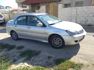  2 ميتسوبيشي لانسر 2004 مستعمل حال الوكاله