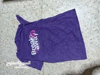  23 بلايز بناتي ستاتي ميديو و لارج و إكس لارج  جديد غير مستعمل تعتبر شروة أكثر من 50 بلوزة