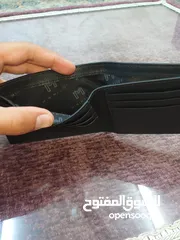  10 محفضة نقود (مينيماليست)جلد جمل صافي 100% اللون الاسود جديدة غير مستخدمة صنع الامارات