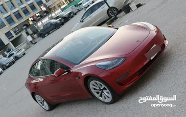  1 Tesla model 3 2022 standard plus/7 جيد / اتوسكور A/ عداد قليل كاش وبالاقساط