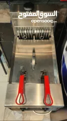  2 معدات مطعم برجر شبه جديد