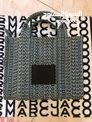  1 حقيبة توتي من ماركس جايكوبس أصليه جديده.Marc Jacobs Tote bag The Washed Monogram Crossbody