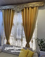  2 برده مع السكه قياس مترتين ونص ميز تلفزيون