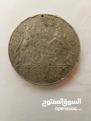  1 عملة ورقية و معدنية و مجموعة طوابع