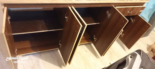  12 خزانه مطبخ تعليق اربع درف والثانية ارضيه ست درف يمكن بيع واحده