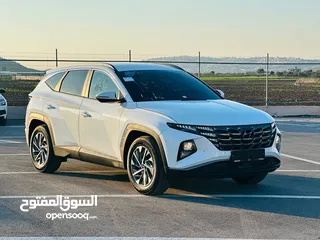  1 هونداي توسان هايبرد ترخيص 2022 ماشية فقط 24 الف ولا غرام بوية وبحالة ممتازة جدا