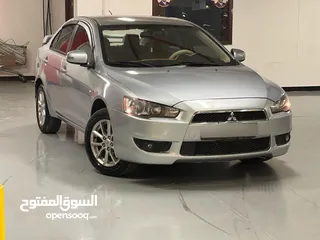  5 ميتسوبيشي لانسر 2016 كرت ابيض