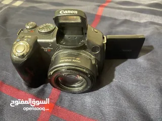  1 كميرا كانون بيع حرق