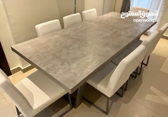  1 Elegant Dining Table (8 Seats) طاولة طعام بتصميم عصري أنيق