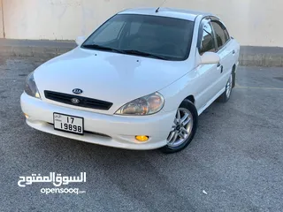  5 كيا ريو اتوماتيك موديل 2003 بحالة ممتازة