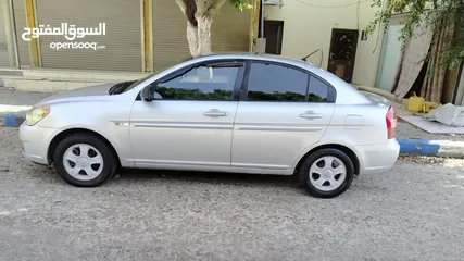  5 هونداي فيرنا 2006 مع كامل الإضافات  (شاشة لمس، كاميرا خلفية، شبابيك كهربا...)