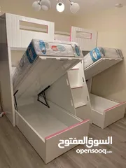  25 تخت طابقين ثلاثي مكفول 5 سنوات بحمل 150 كيلو  الخشب لامنيت مسمك ع خمالتين 3.5 سم