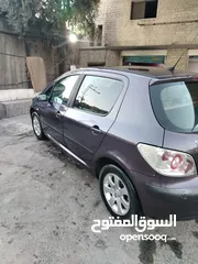  7 بيجو 307 2004