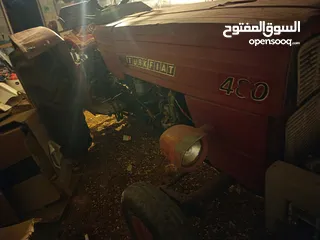  12 تركتر فيت 450 مع عودين حراث وتنك رش مع بربيش 200 متر وسلة محمولة(كف)