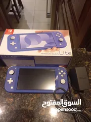  3 Nintendo switch lite used like new with mario traveling case مستعمله استعمال خفيف بحاله الوكاله