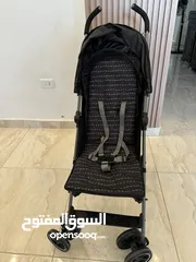  1 عرباية  اطفال mothercare لون اسود ورمادي