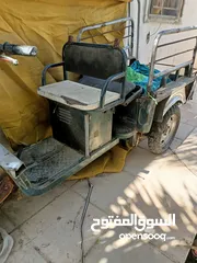  1 دراجه 3 عجلات مع قلاب مع 2 مقعد ,
