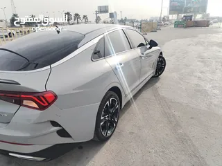  12 كيا K5 موديل 2023 اسمنتي حرة بدون رقم تترقم اي محافظة تعجبك   ماشيه 39 الف مواصفات 1600GT LlNE