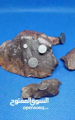  17 Jabal Kamel Hadidi meteorites, Tripoli, Libya, weight: one kilogram and 200 gram