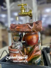  16 نافورة ديكور بمجرى ماء وشلال مضيء أضف لمسة من الهدوء والجمال الطبيعي لبيتك أو مكتبك مع هذا التص