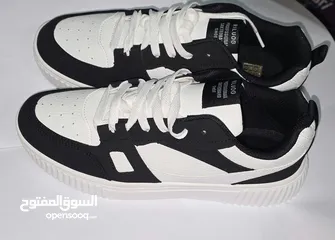  3 Black and white designer shoes  size: 42 negotiable price  FREE DELIVERY