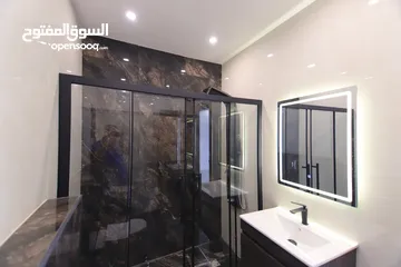  10 شقة شبه أرضي مع حديقة وكراج مستقل بأجمل مواقع ضاحية الرشيد