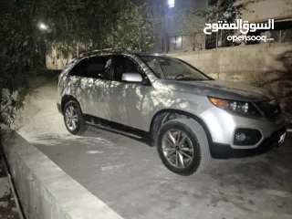  5 كيا سيرنتو4×4ديزل متور2200 فول اضافات فتحه بانوراما هوك مسجل بترخيص