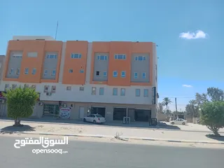  2 مبنى اربع طوابق تشطيب حديث يطل مباشرة على طريق مزدوج قصر أحمد