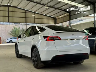  15 Tesla Model Y 2022 ( LONG RANGE DUAL MOTOR )  فحص الشريف  7 جيد  ، B+ اوتوسكور ايرباج مغلق غير مفتوح