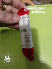  1 Red satin ribbon . used for decoration