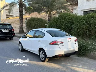  12 مازدا زوم 2 موديل 2012 فحص كامل 7 جيد ولا ملاحظة لون ابيض قاطعة مسافة 100 الف كيلو فقط (استخدام شخصي