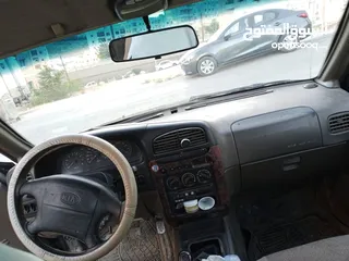  7 كيا سبورتج 2001 لون اسود للبيع