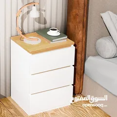  1 خزانة بيضاء جانبية أنيقة بلمسة خشبية عصرية  الاناقة والبساطة في تصميم واحد  ادراج عملية لحفظ اغراضك
