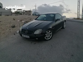  1 مرسيدس SLK 2003 لون أسود ملوكي، كشف، ترخيص جديد وارد غرغور مالك ثالث من الوكالة