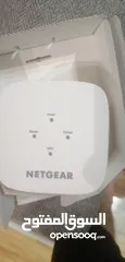  5 تلفون ارضي Panasonic و مقوي شبكة و راوتر Netgear