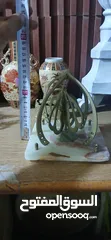  4 مكواي نحاس/ومنضر نحاس ارضية رخام/وكاسة صغيرة نحاس/ومنضرين نحاس وعليهم زي شقف  اضن رخام