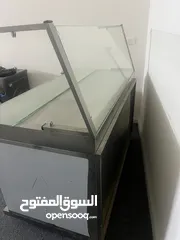  5 طاوله عرض جديده  مع رف زجاج