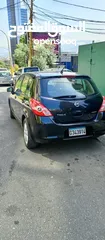  4 tida nissan 2010   تيدا   نيسان فول اوبشن لون اسود وفرش اسود  ماشيه 117,000km ABS Air bag جيدا جدا