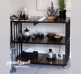  1 طاولات ترولي و يجود طاولات خدمه كلها جديده