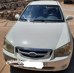  2 كيا سيراتو 2006 ماتور 1600 اوتومات. دهان اصلي مع تصليح عيوب بسيطة في البودي