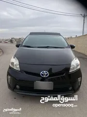  6 تويوتا بريوس 2015 هايبرد فل كامل مع بانوراما أعلى صنف بكج ( 5) لون اسود مميز