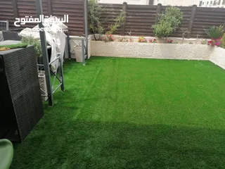  7 عشب صناعي (ترتان) وأشجار و ورد صناعي
