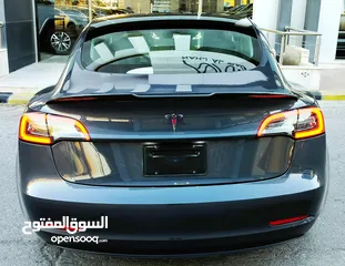  18 تيسلا 2023 model 3 فحص كامل اوتوسكور +B بحالة الوكالة لون فيراني مميز للبيع بسعر لقطة ومحروووق