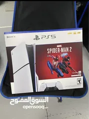  1 Sony PlayStation 5 slim disc spider man 2, comes with the console, 2 original controllers.