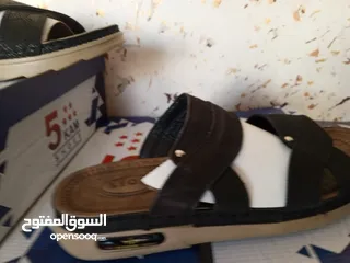 13 محل ملابس قطنيات اصلية واحذية طبية جلد اصلي